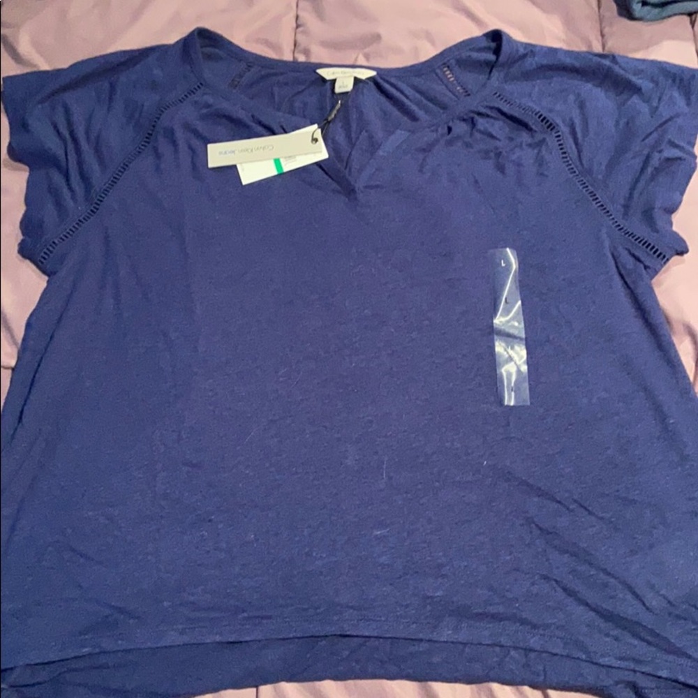 Calvin Klein Blue top. Large.